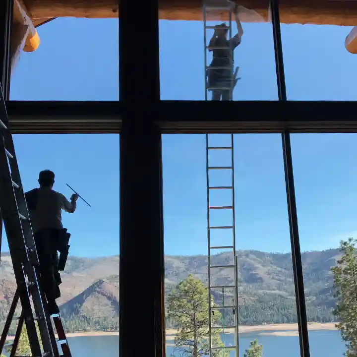 cleaning a window in durango